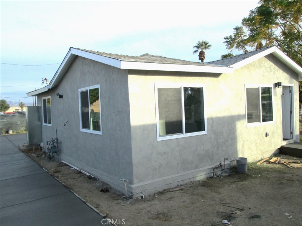 44552 Arabia Street Indio, CA 92201 - Photo 31 of 49 a view of backyard of the house