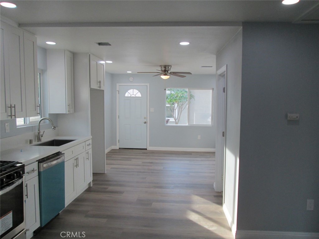 44552 Arabia Street Indio, CA 92201 - Photo 35 of 49 a view of a kitchen cabinets and chandelier