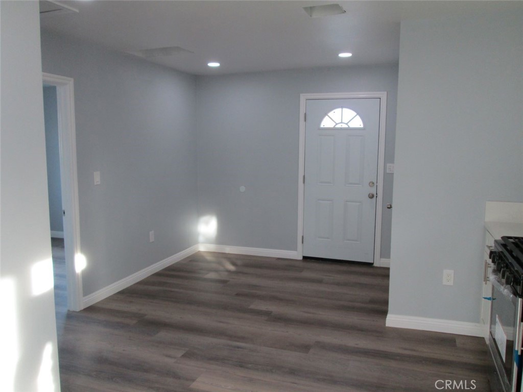 44552 Arabia Street Indio, CA 92201 - Photo 37 of 49 a view of empty room with wooden floor