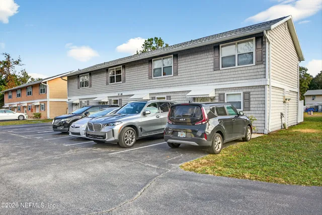 a car parked in front of a house