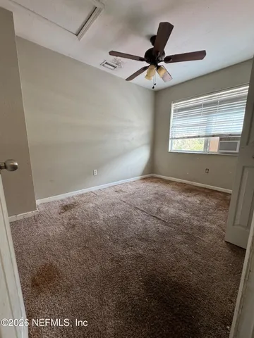 a front view of a house with a yard and porch