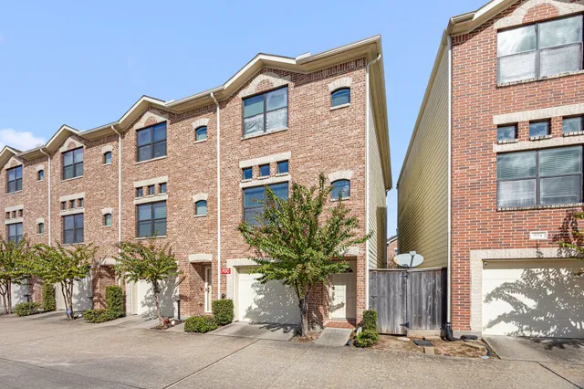 a front view of a building with a street