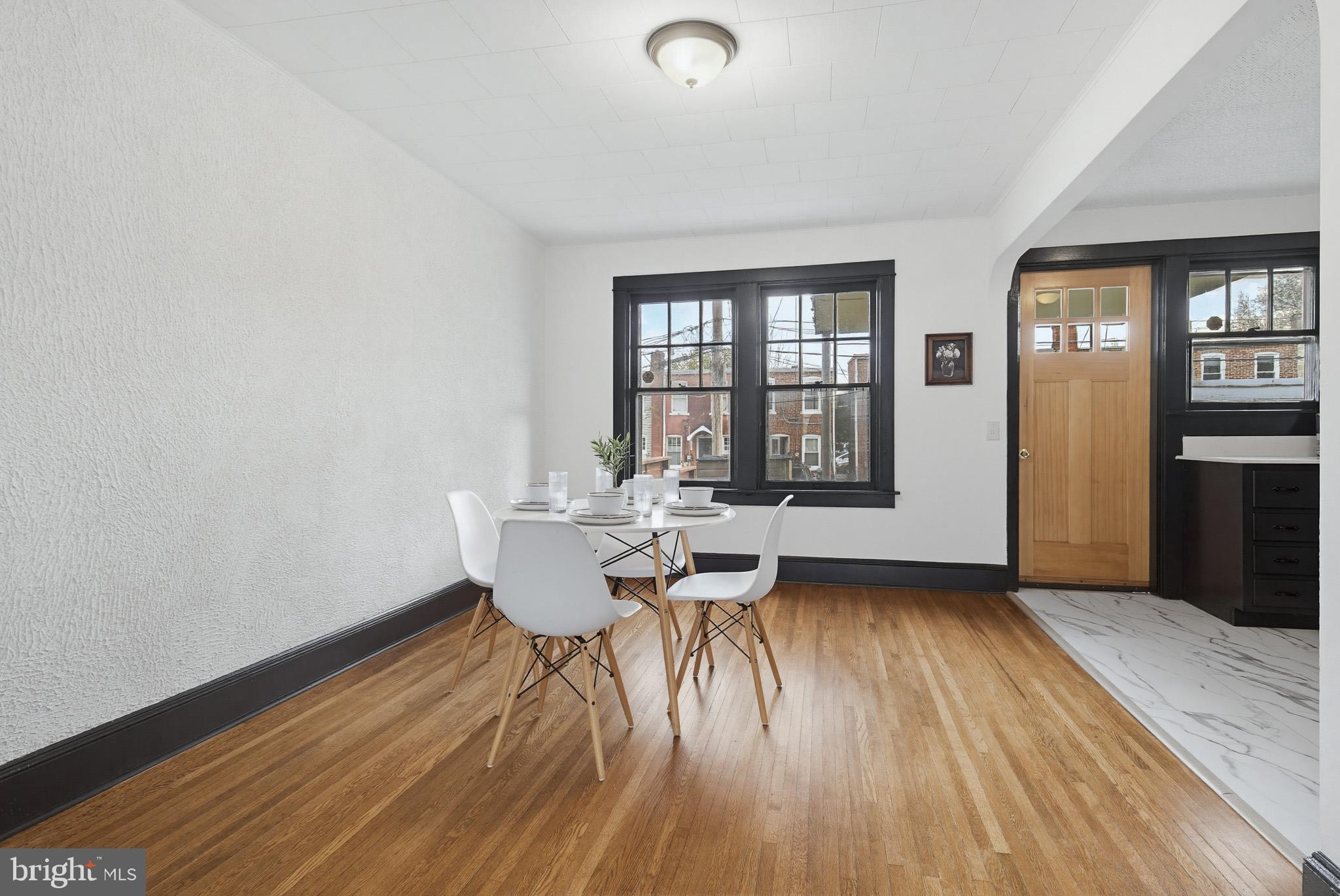636 3rd Street Lancaster, PA 17603 - Photo 11 of 42 a view of a dining room with a table and chairs