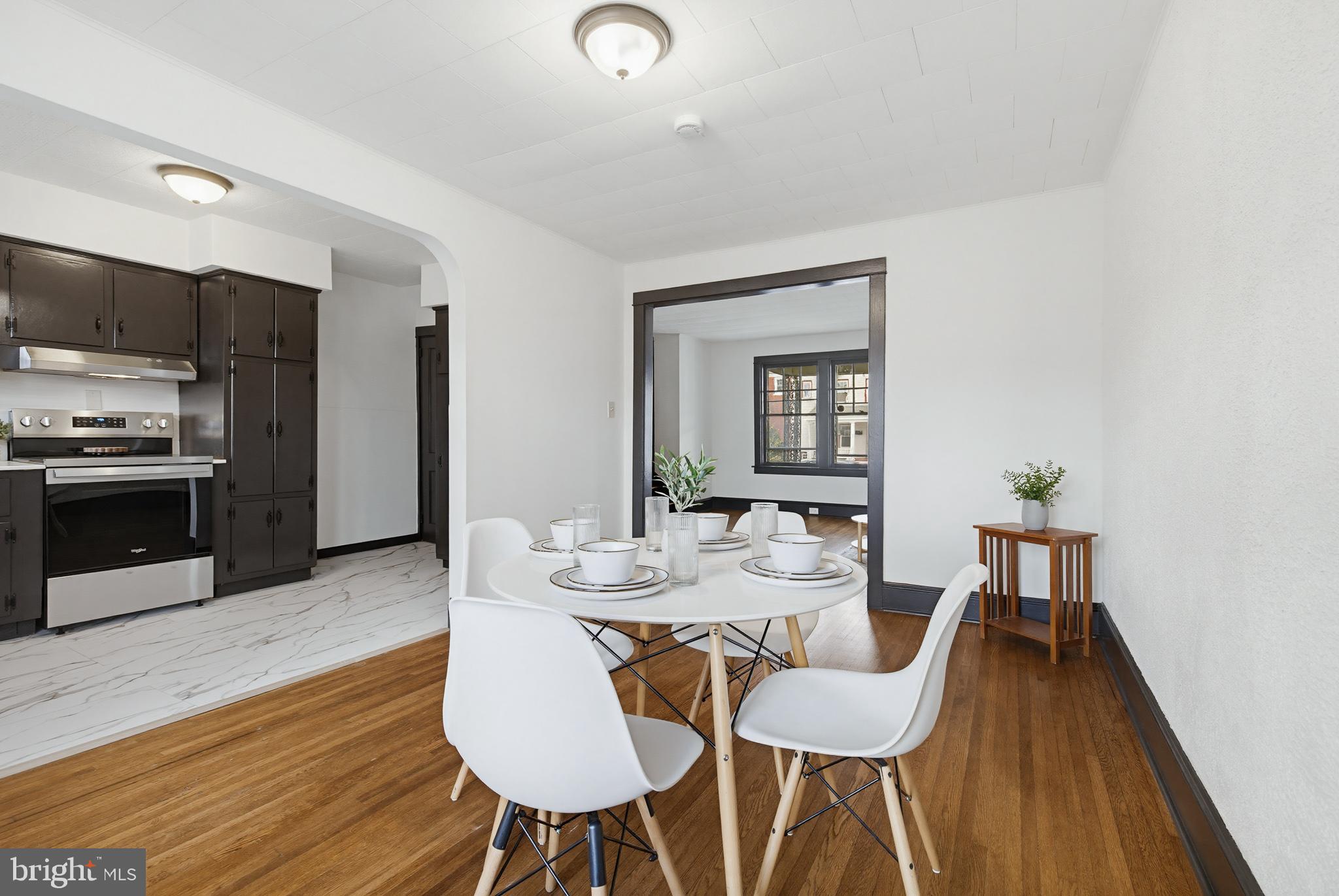 636 3rd Street Lancaster, PA 17603 - Photo 13 of 42 a view of a dining room with furniture and wooden floor