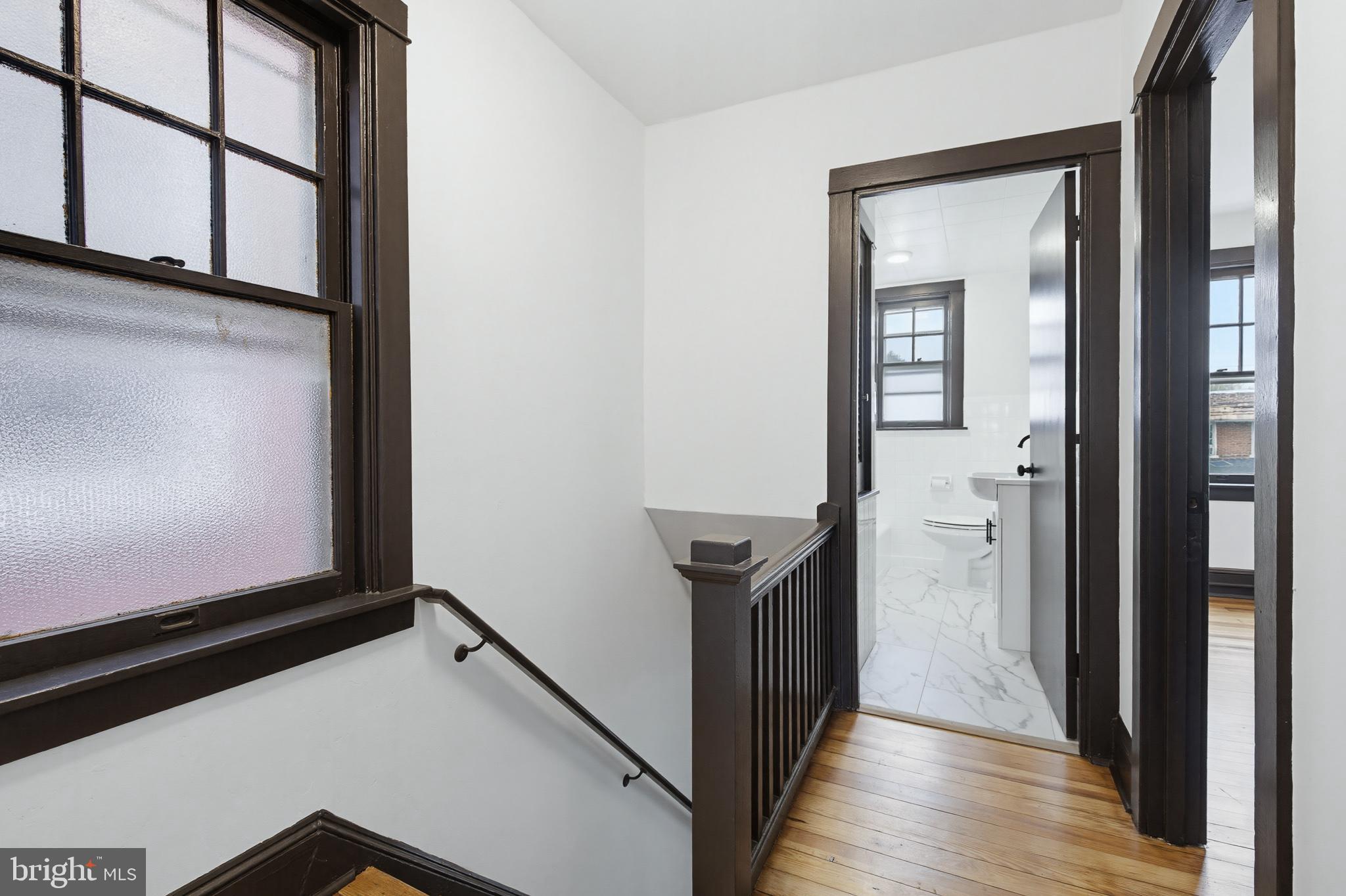 636 3rd Street Lancaster, PA 17603 - Photo 17 of 42 a view of a hallway with wooden floor