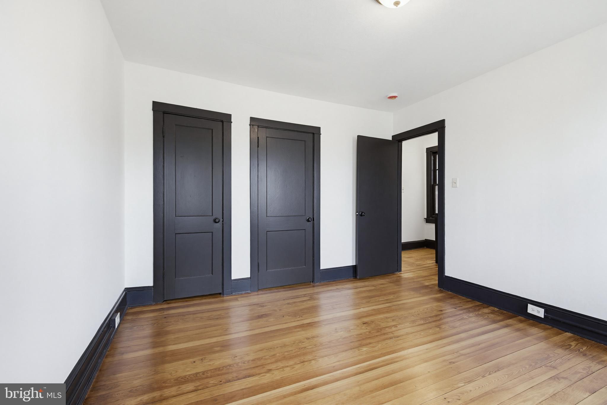636 3rd Street Lancaster, PA 17603 - Photo 28 of 42 a view of an empty room with wooden floor