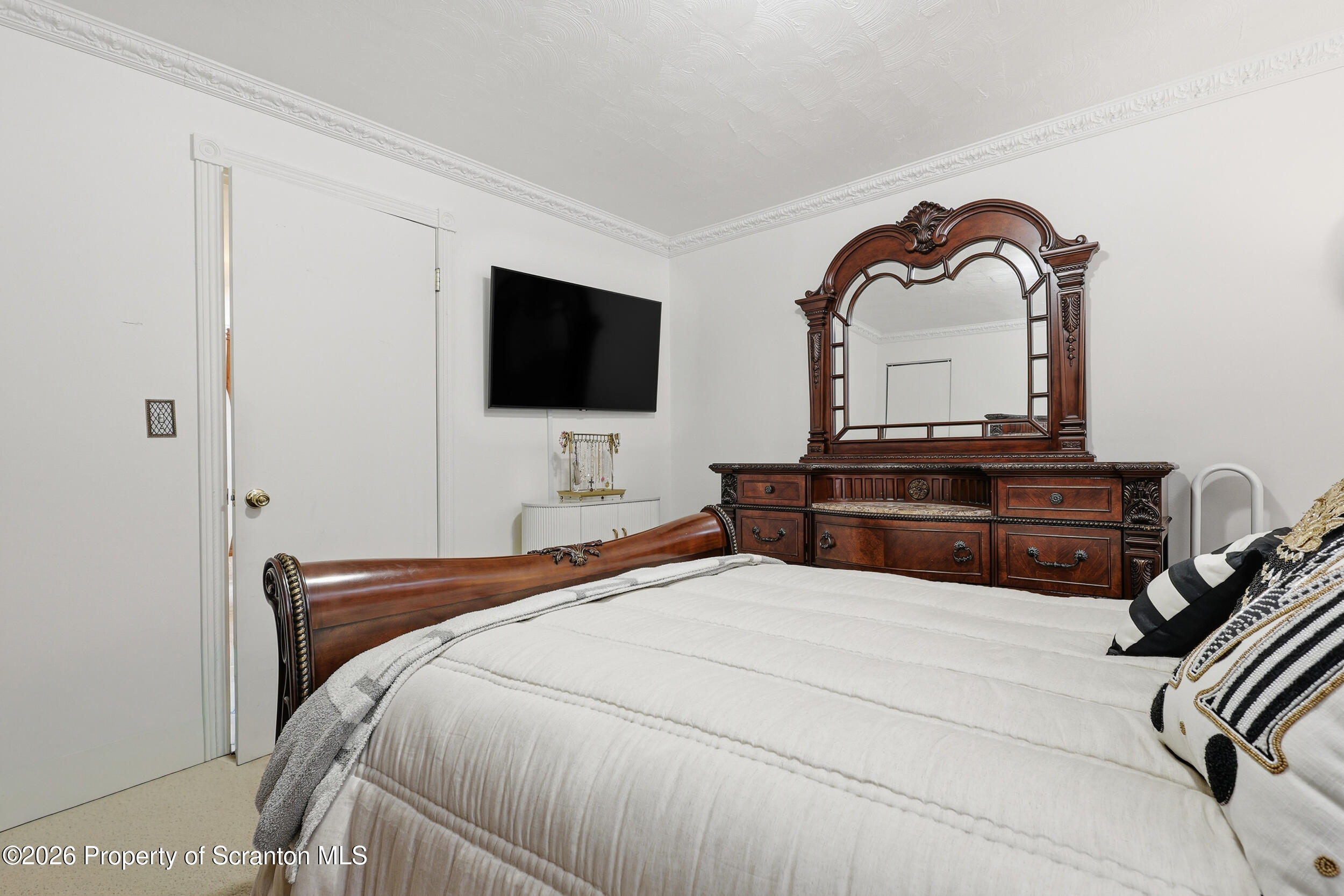 143 Old Boston Road Pittston, PA 18640 - Photo 30 of 61 a bedroom with a bed and a flat screen tv