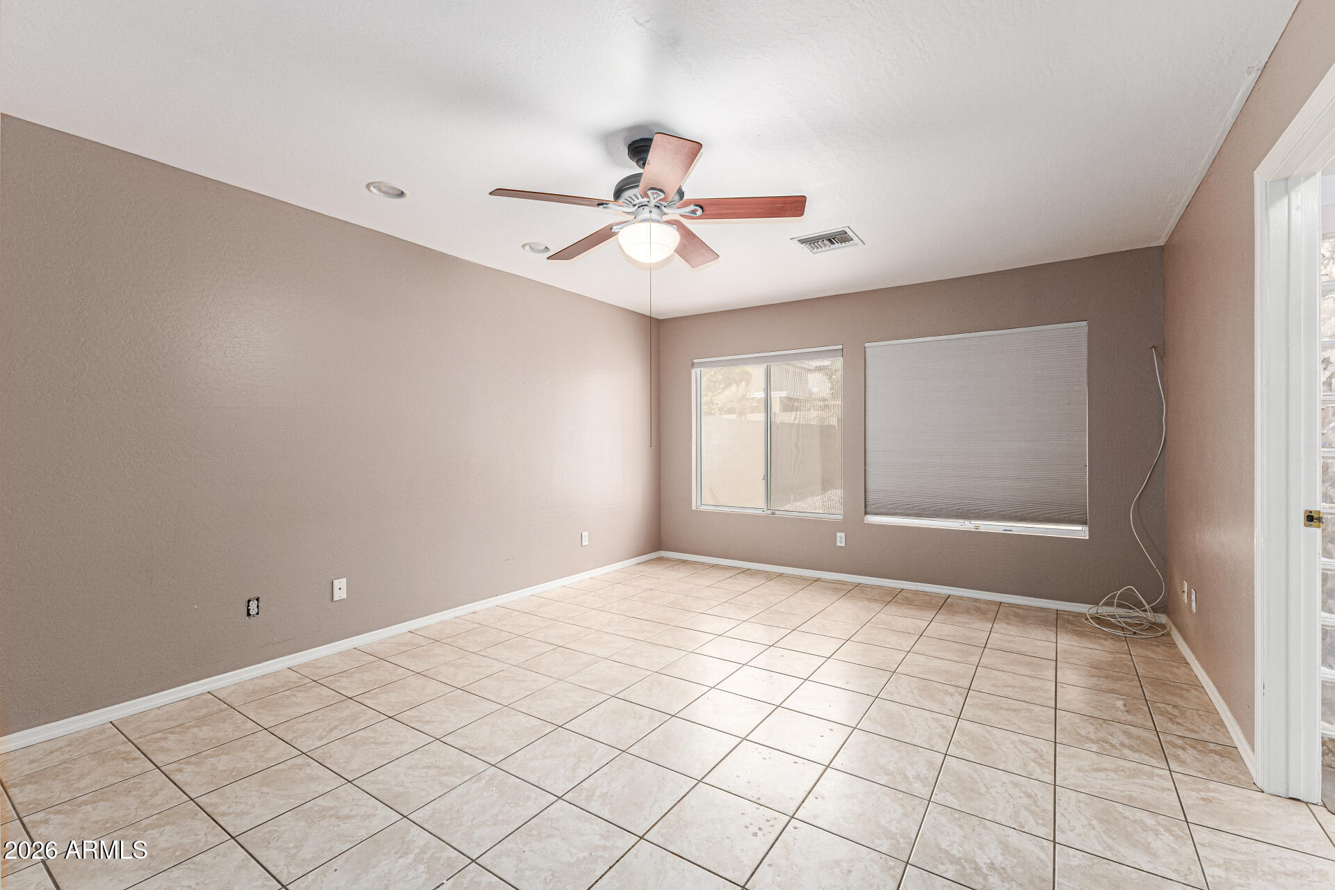 6356 West Avenida Del Rey Phoenix, AZ 85083 - Photo 11 of 31 a view of an empty room and window