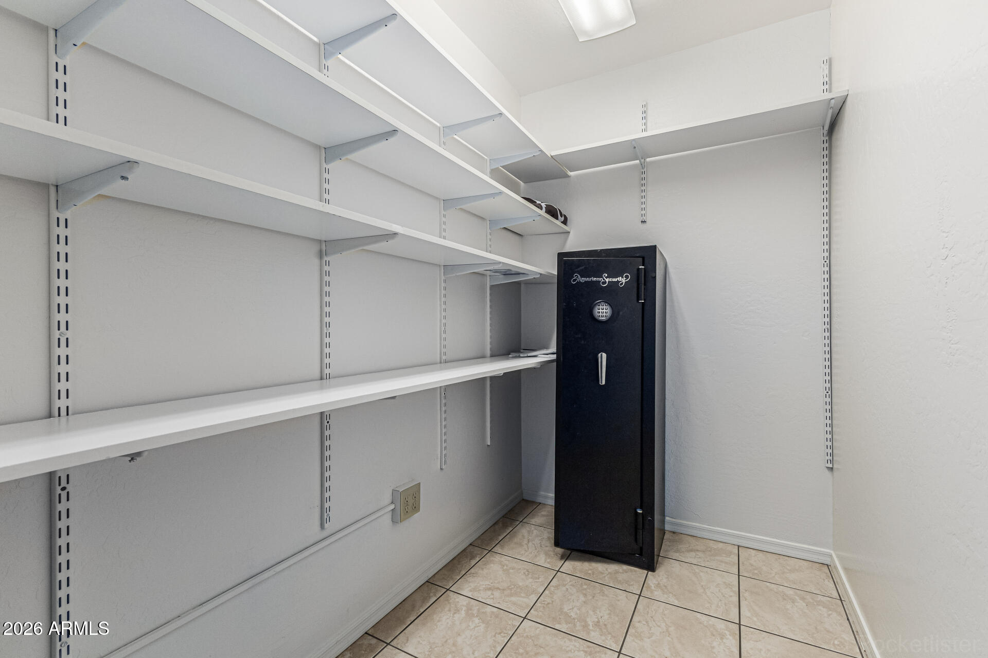 6356 West Avenida Del Rey Phoenix, AZ 85083 - Photo 13 of 31 a view of an empty walk in closet