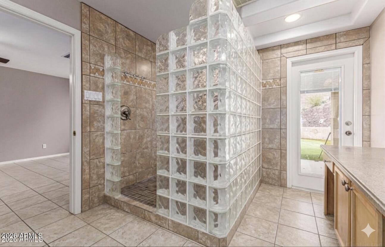 6356 West Avenida Del Rey Phoenix, AZ 85083 - Photo 16 of 31 a view of a bathroom with a shower