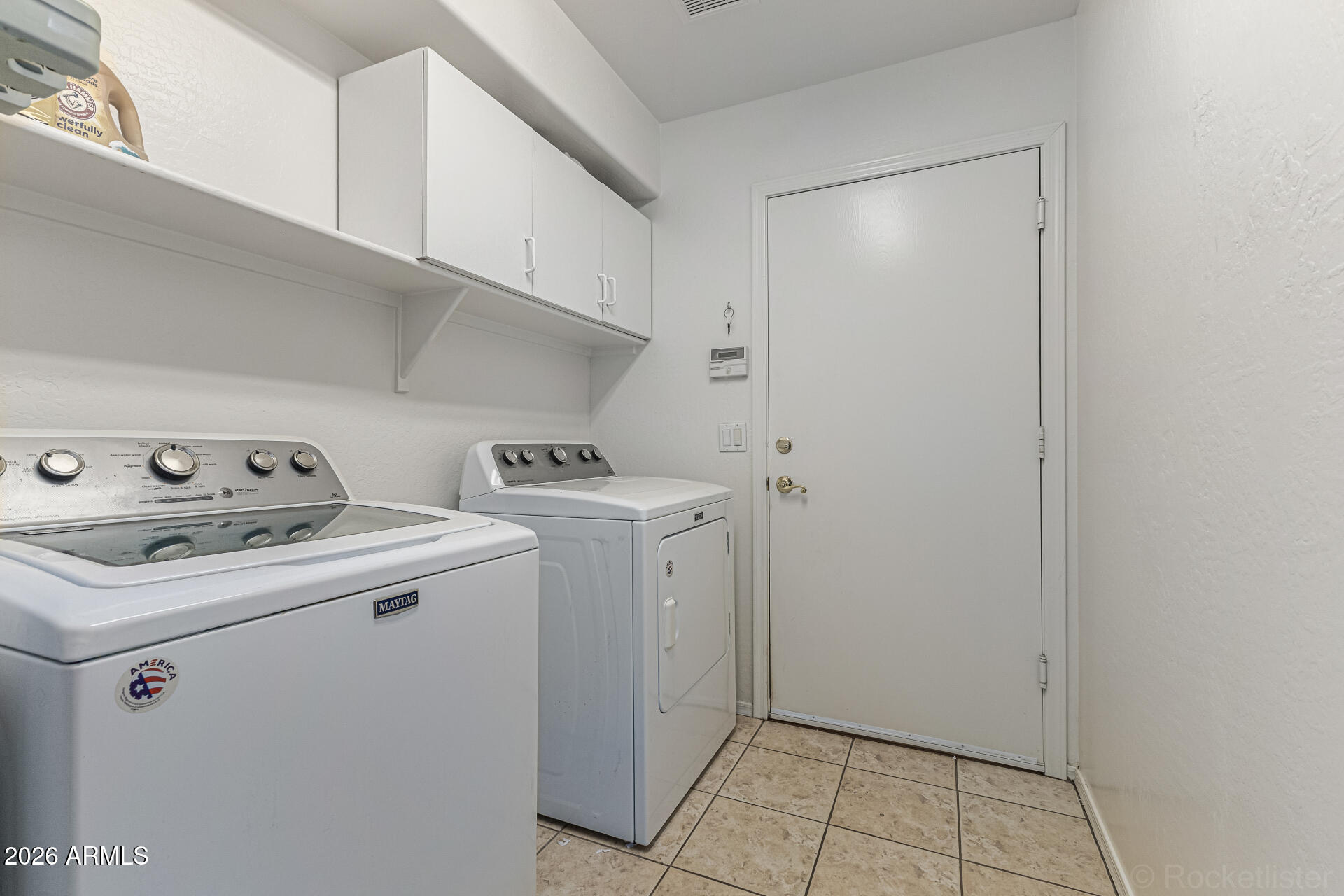 6356 West Avenida Del Rey Phoenix, AZ 85083 - Photo 21 of 31 a utility room with dryer and washer