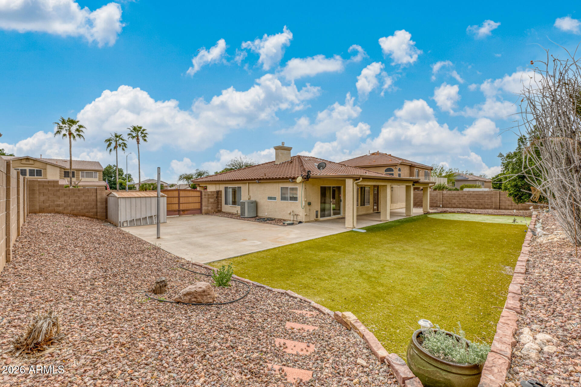 6356 West Avenida Del Rey Phoenix, AZ 85083 - Photo 24 of 31 a front view of a house with swimming pool