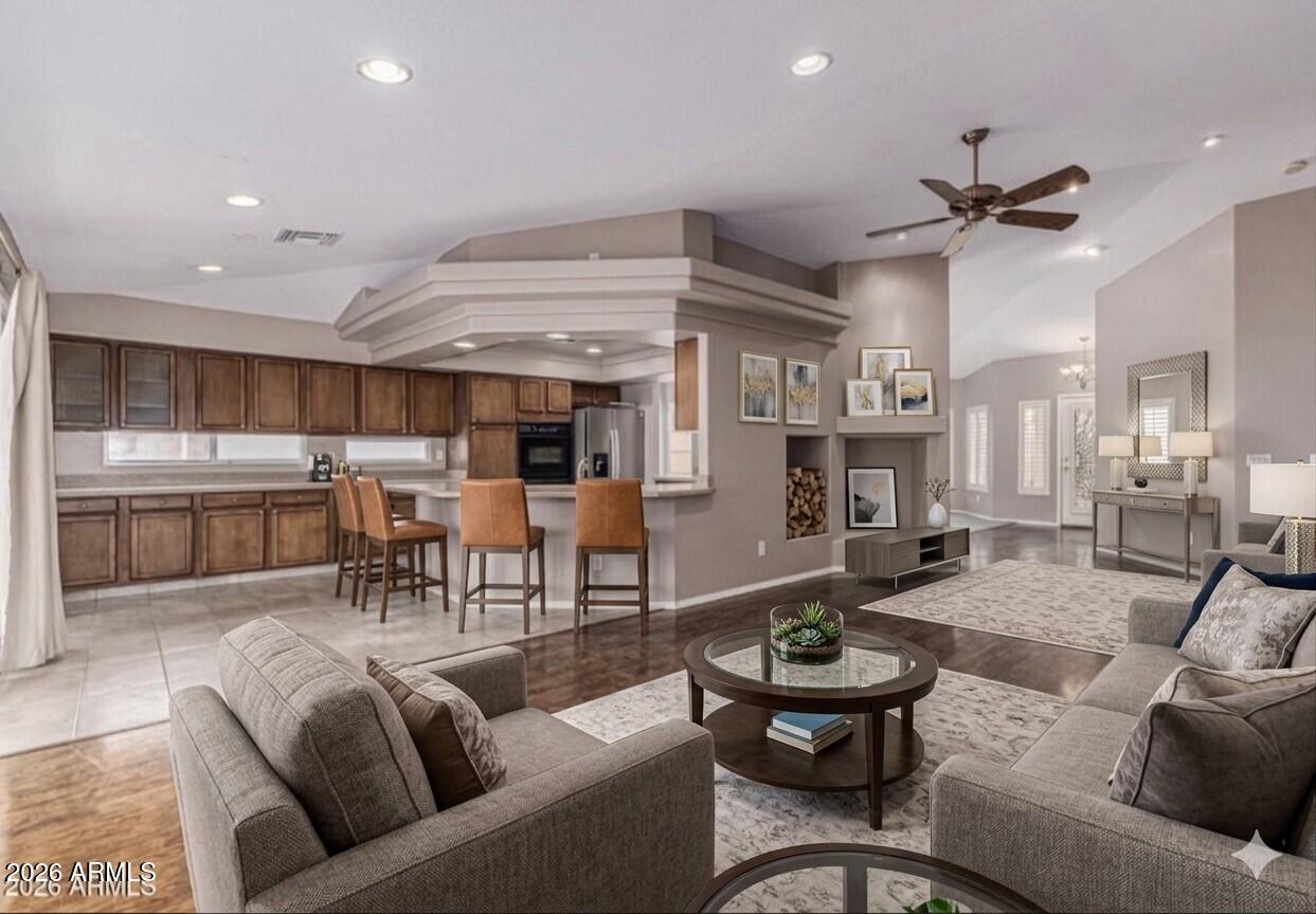 6356 West Avenida Del Rey Phoenix, AZ 85083 - Photo 3 of 31 a living room with furniture kitchen and a table