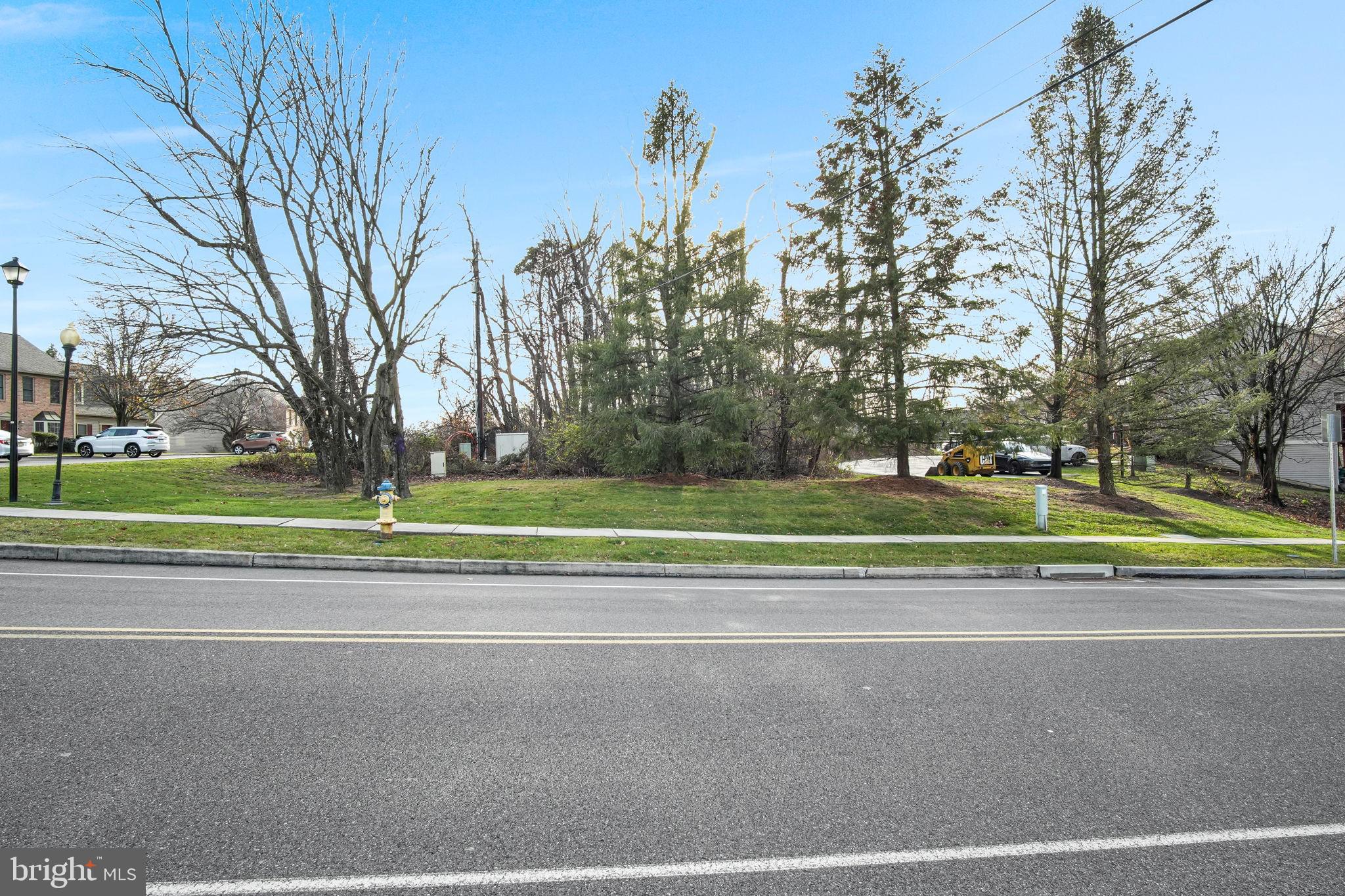 Mountain View Road Mechanicsburg, PA 17050 - Photo 4 of 17 a view of a tennis ground with trees in the background