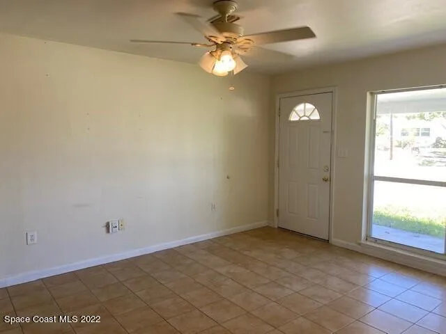 a view of an empty room and window