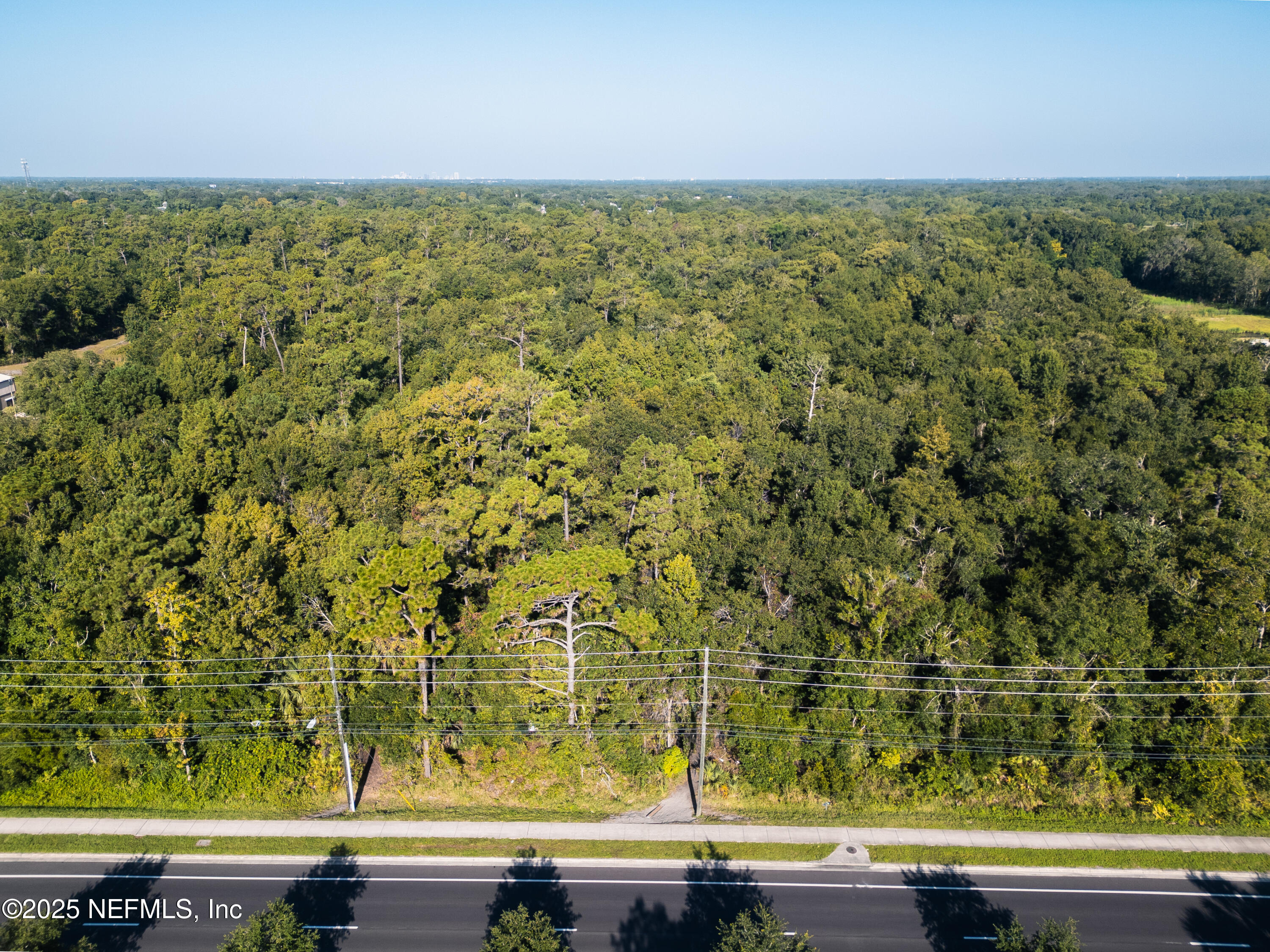2310 Rouse Road Orlando, FL 32817 - Photo 10 of 14 a view of a floor to ceiling window and an ocean