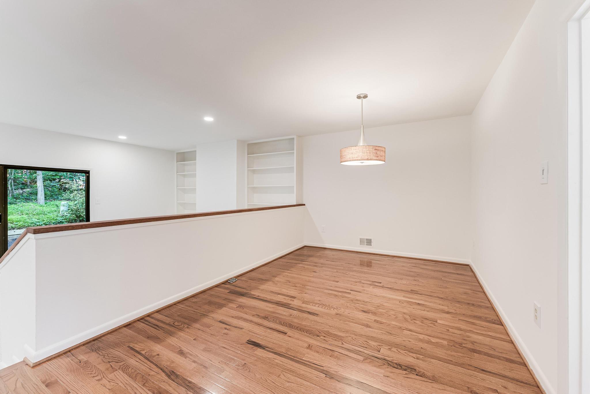 12023 Insha Court Reston, VA 20191 - Photo 25 of 52 wooden floor in an empty room with a window