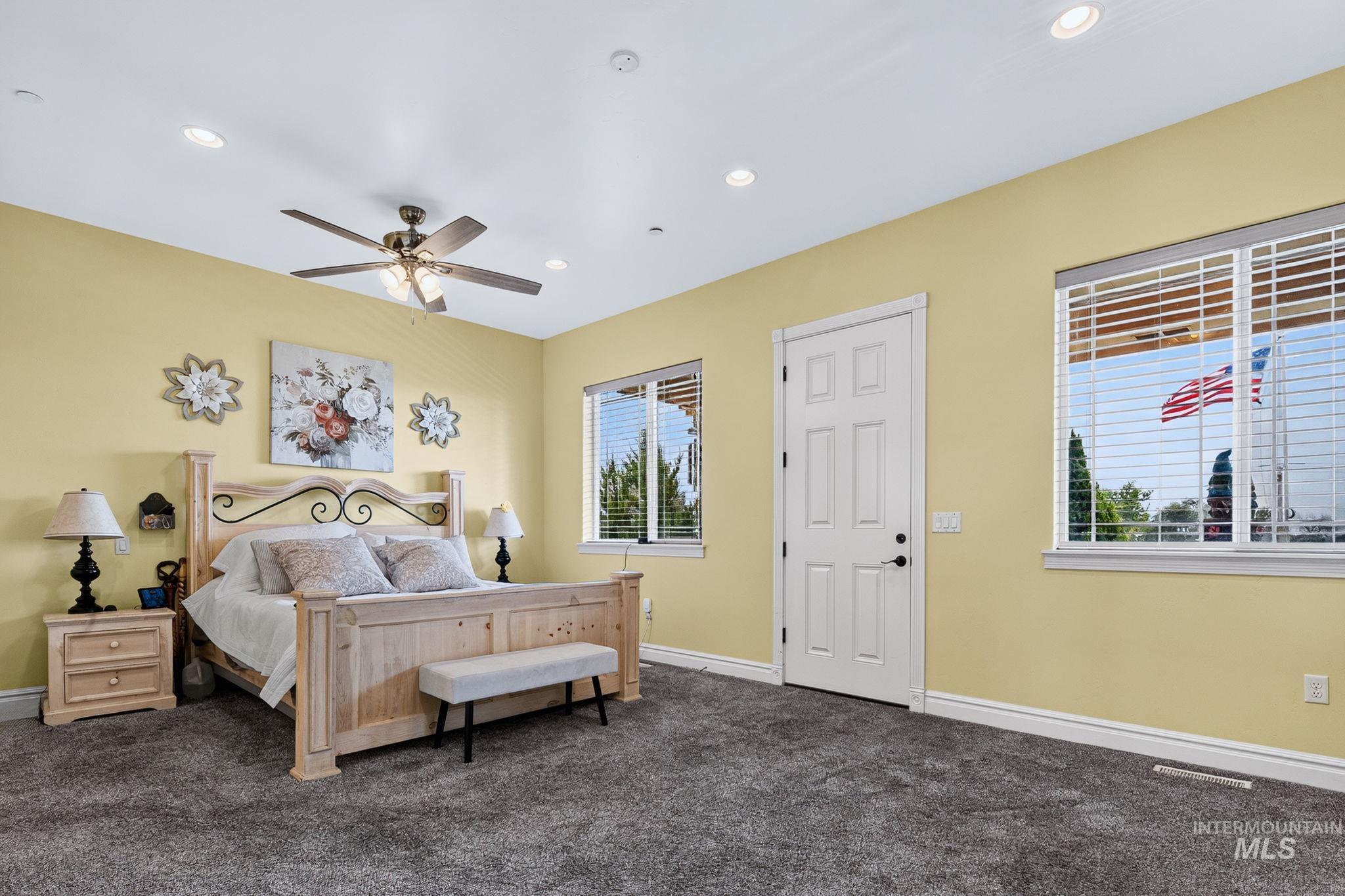 11378 Purple Sage Road Middleton, ID 83644 - Photo 22 of 50 Dedicated media room featuring recessed lighting, ceiling-mounted projector, and a ceiling fan