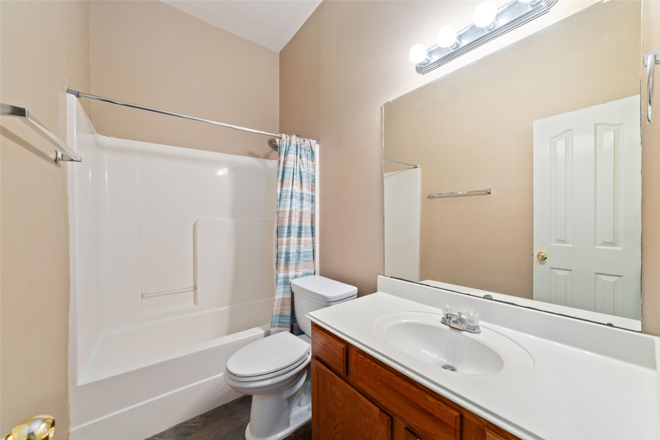 22911 Sebastian Drive Porter, TX 77365 - Photo 19 of 23 a bathroom with a sink toilet and shower
