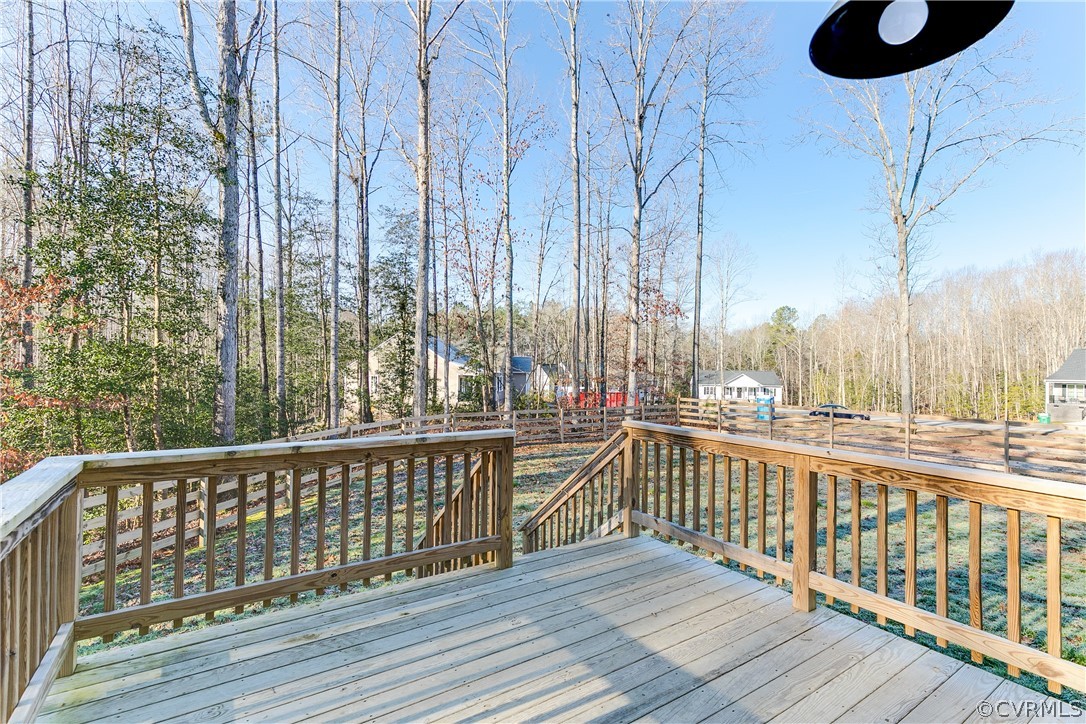 121 Pine Haven Road Aylett, VA 23009 - Photo 29 of 33 Attached deck outside the kitchen faces woods behi