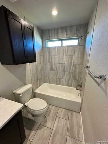 a view of staircase with white walls