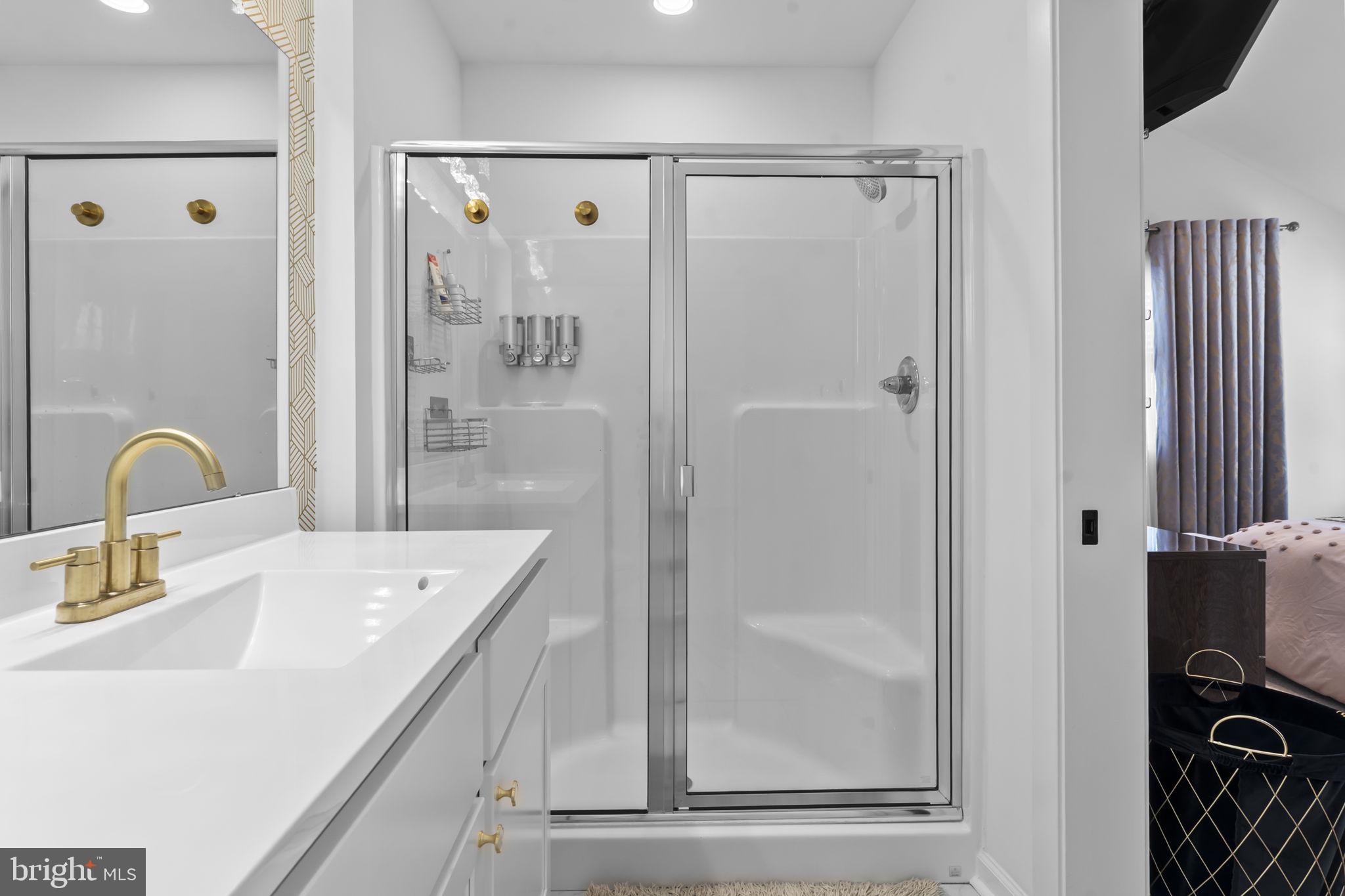 122 Church Road Jenkintown, PA 19046 - Photo 25 of 38 a bathroom with a bathtub and a shower