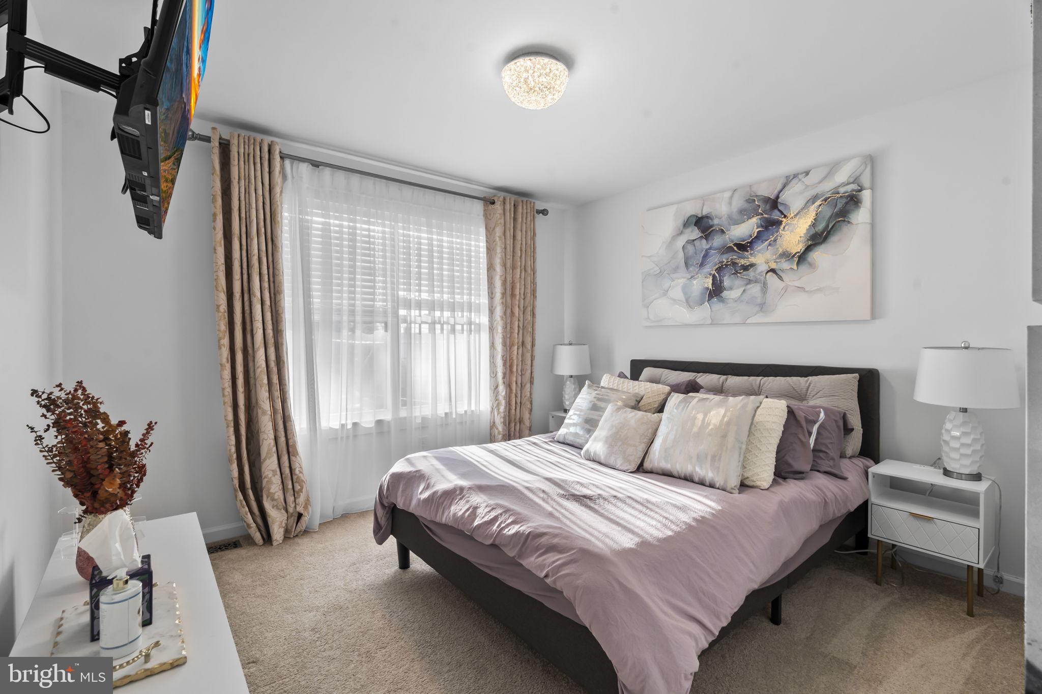 122 Church Road Jenkintown, PA 19046 - Photo 26 of 38 a bedroom with a bed and a window