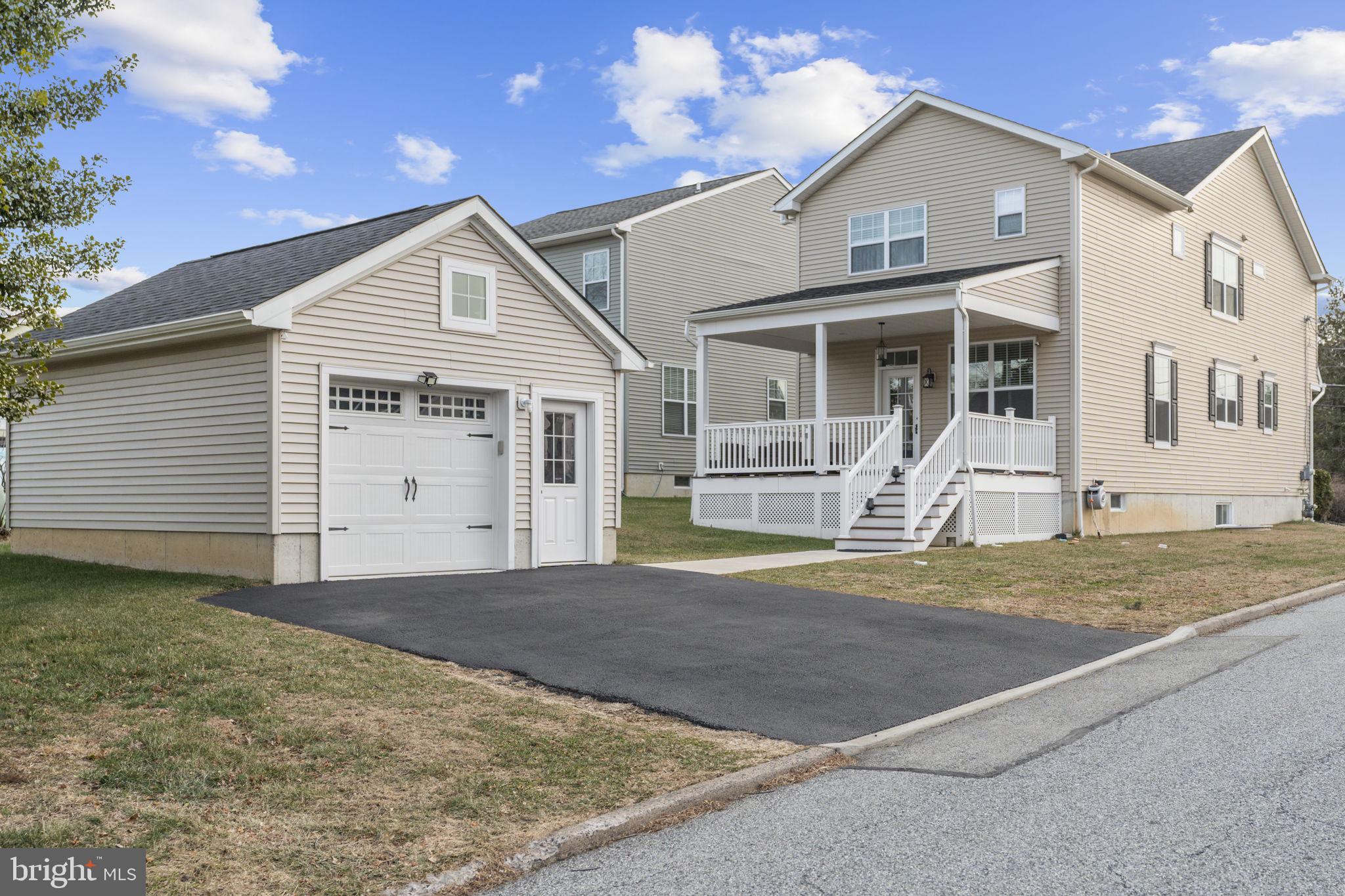 122 Church Road Jenkintown, PA 19046 - Photo 4 of 38 a front view of a house with a yard