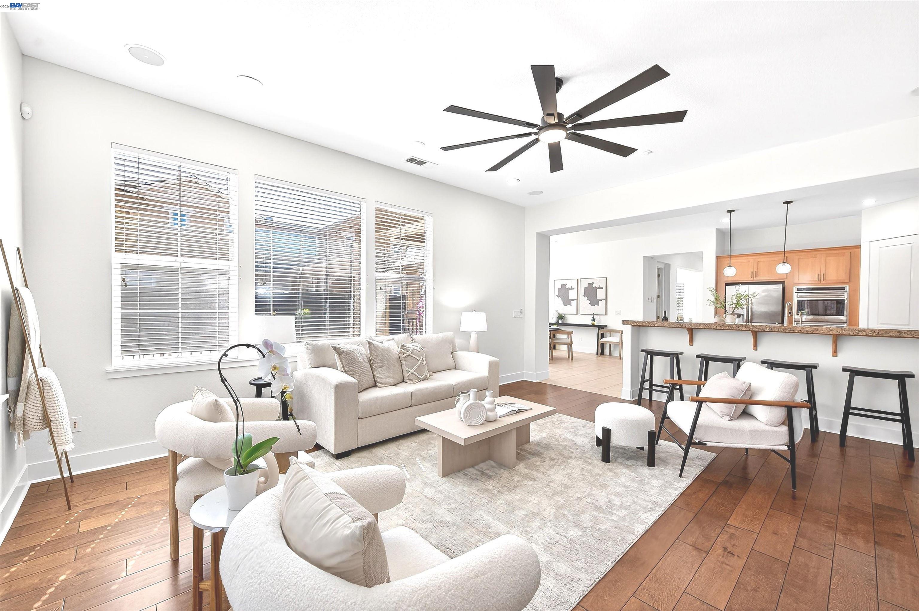 5564 Stockton Loop Livermore, CA 94550 - Photo 15 of 45 a living room with furniture and a large window
