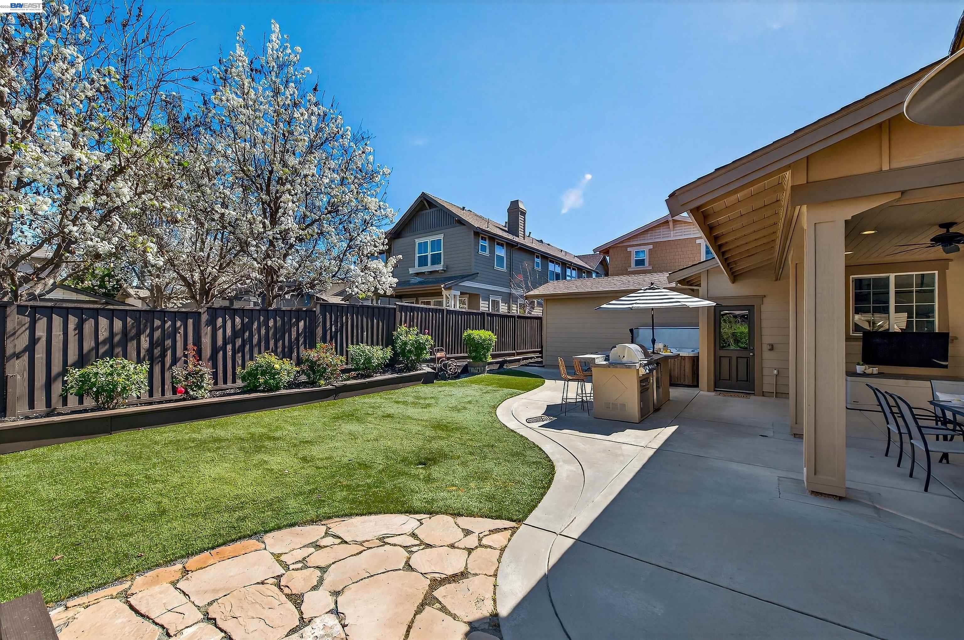5564 Stockton Loop Livermore, CA 94550 - Photo 31 of 45 a front view of a house with garden