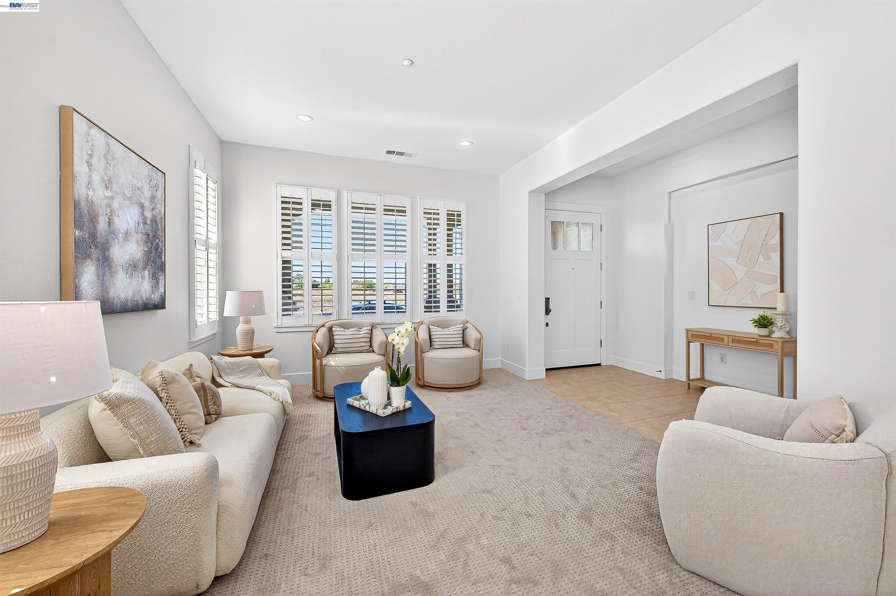 5564 Stockton Loop Livermore, CA 94550 - Photo 5 of 45 a living room with furniture and a large window