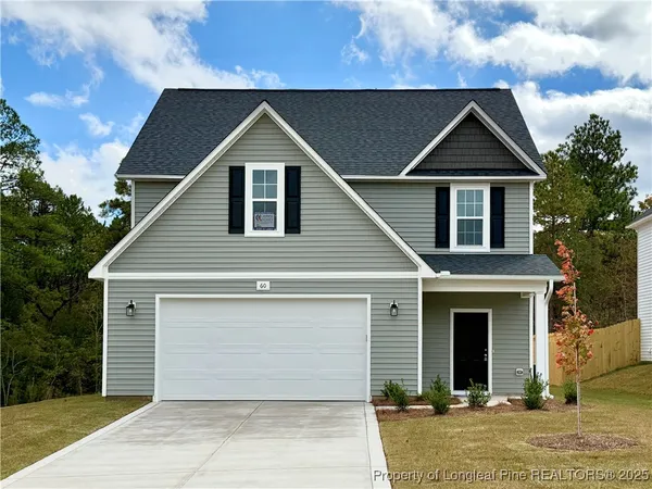 a front view of a house with yard