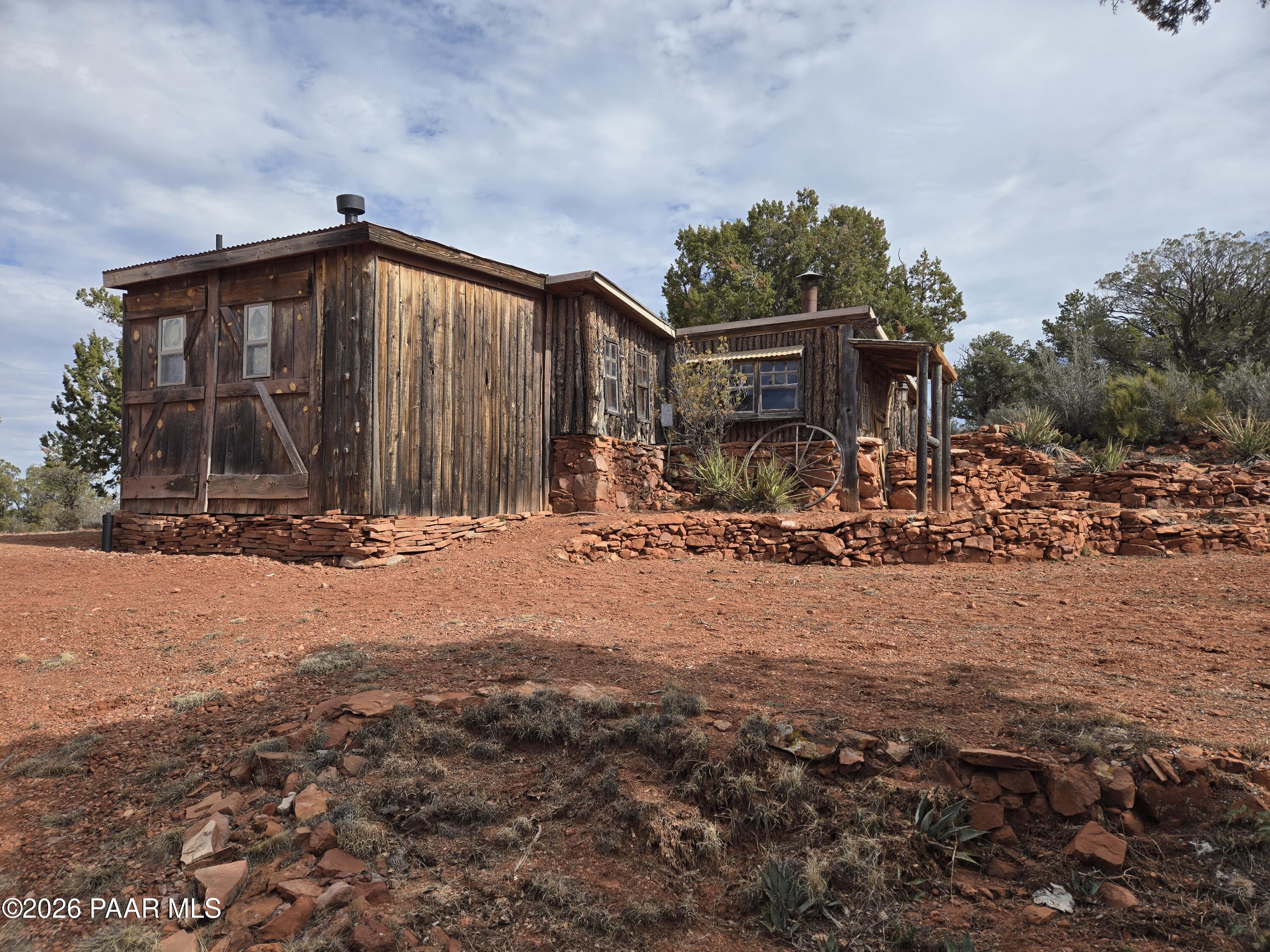 38125 North Snake Road Ash Fork, AZ 86320 - Photo 2 of 34 a view of a house with backyard