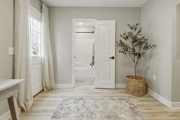 a bathroom with a bathtub and a sink