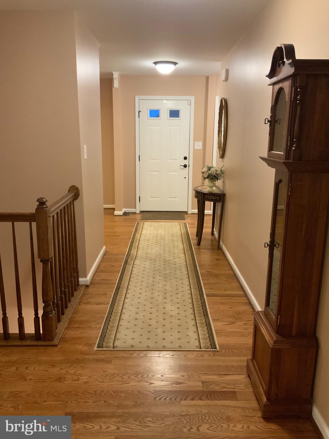 123 Reprisal Road Inwood, WV 25428 - Photo 21 of 64 Wide Hallway Leading to Front Door