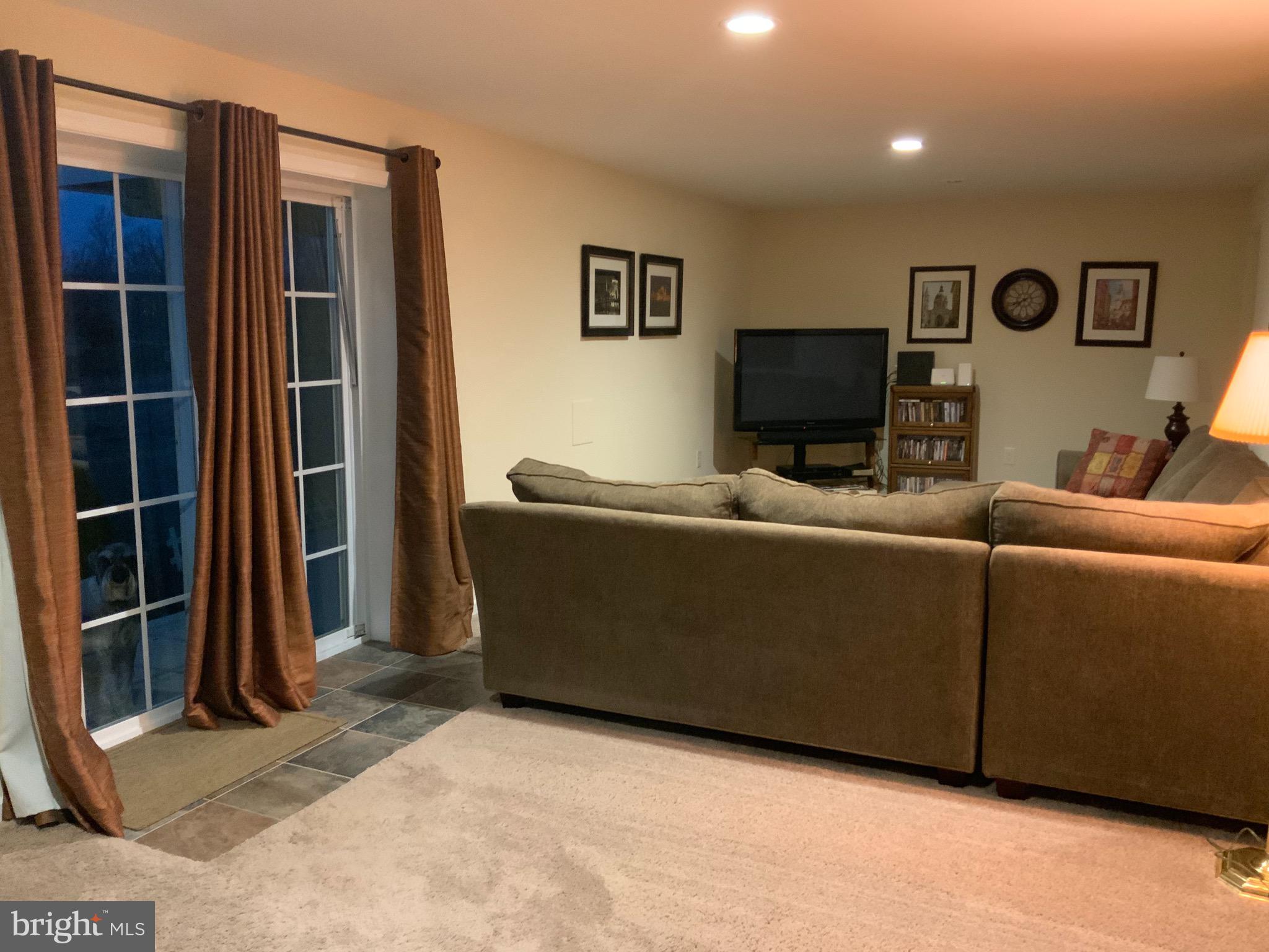 123 Reprisal Road Inwood, WV 25428 - Photo 41 of 64 Family Room w/ Walk out French Door