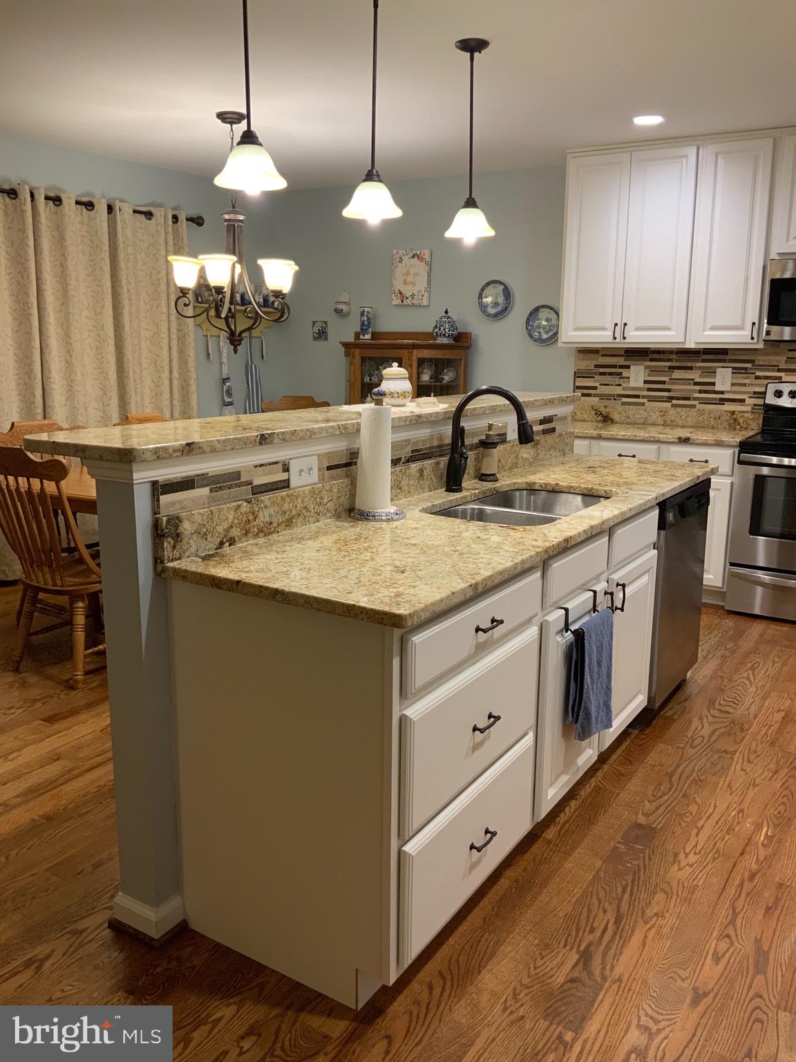 123 Reprisal Road Inwood, WV 25428 - Photo 8 of 64 kitchen Island w/ Sink, Granite Counter