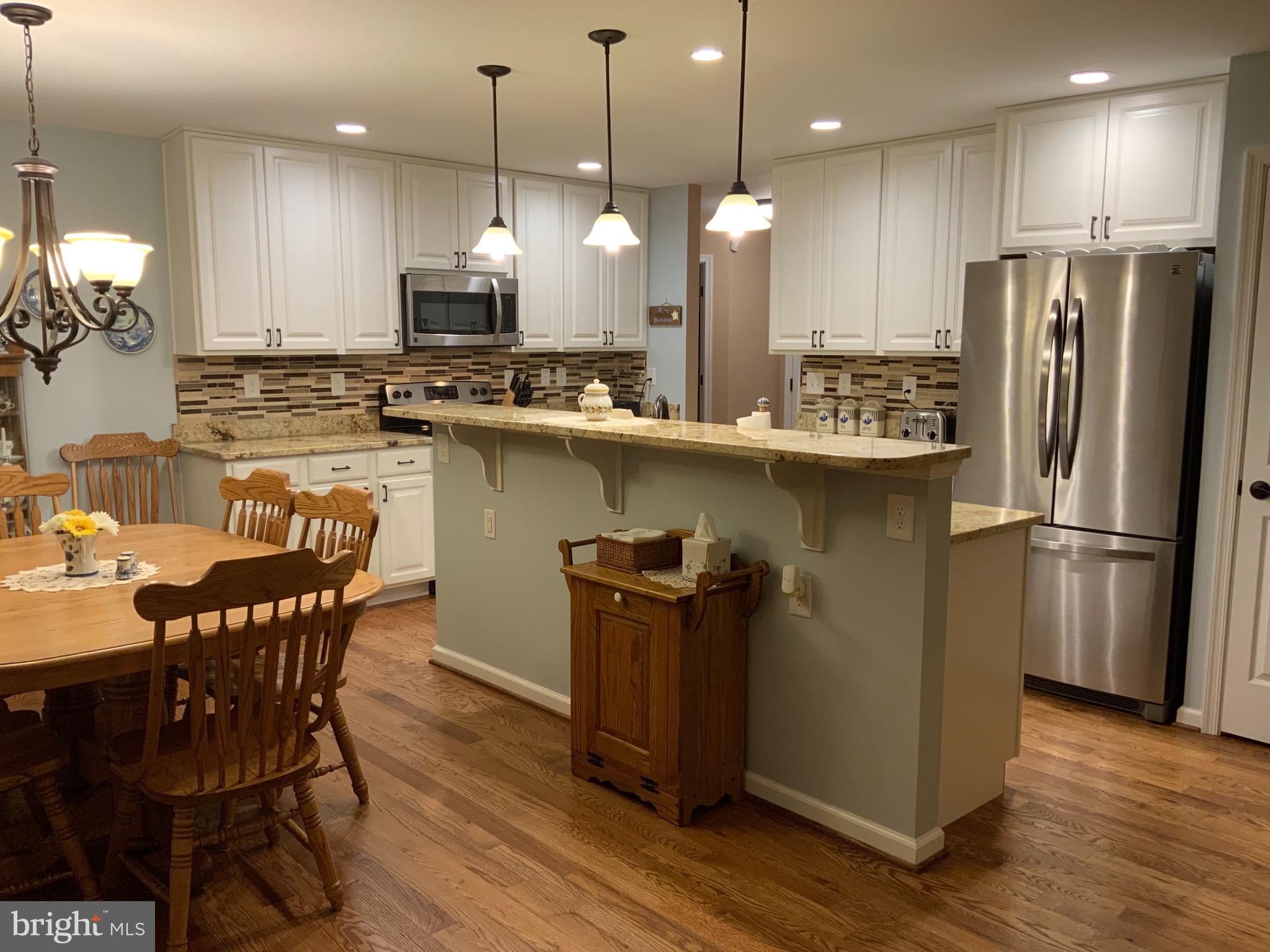 123 Reprisal Road Inwood, WV 25428 - Photo 10 of 64 Kitchen w/Breakfast Bar
