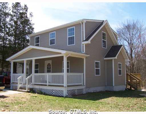 79 Wauregan Road Killingly, CT 06239 - Photo 1 of 1 a view of a house with a yard