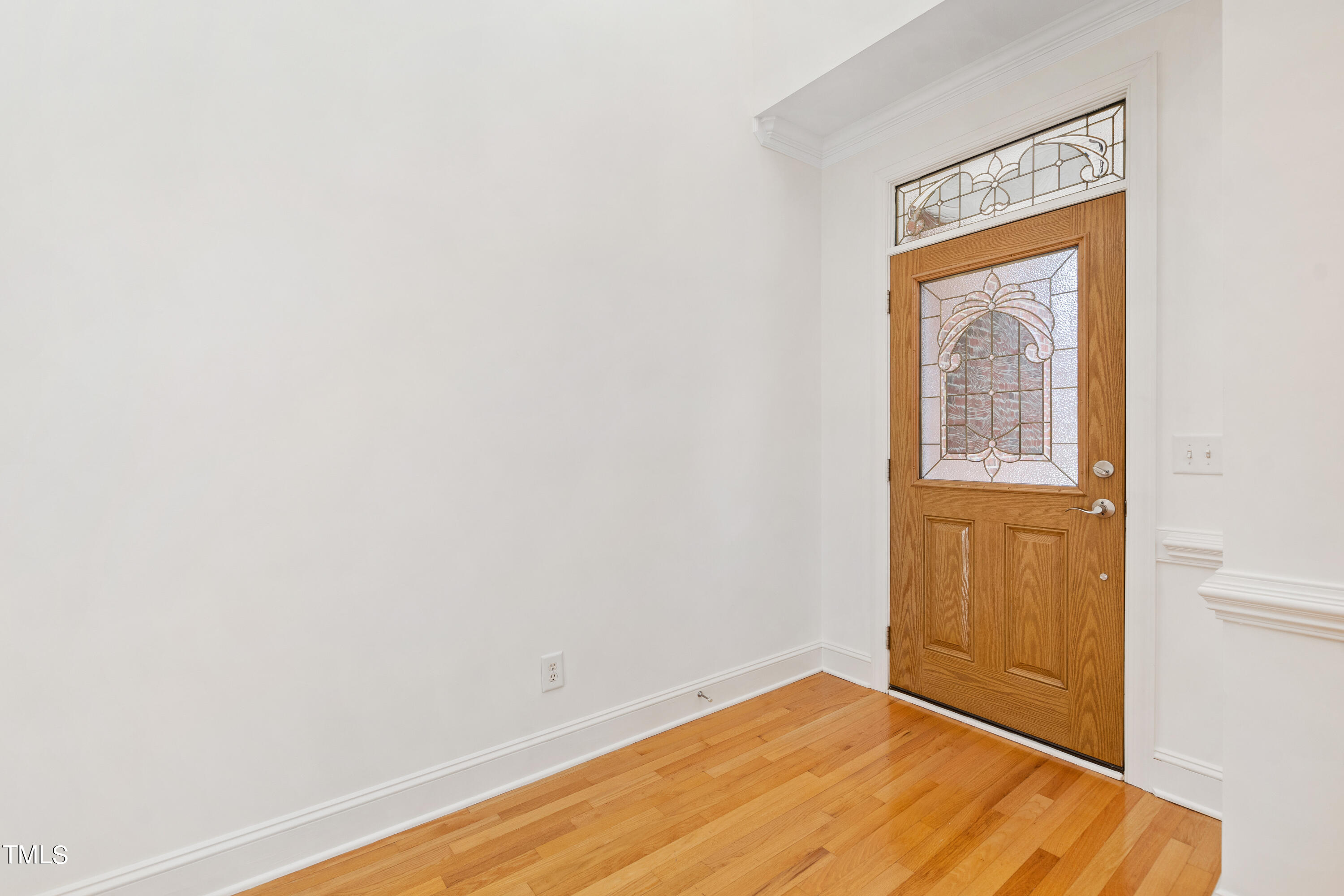 7360 Fontana Ridge Lane Raleigh, NC 27613 - Photo 9 of 48 an empty room with a window