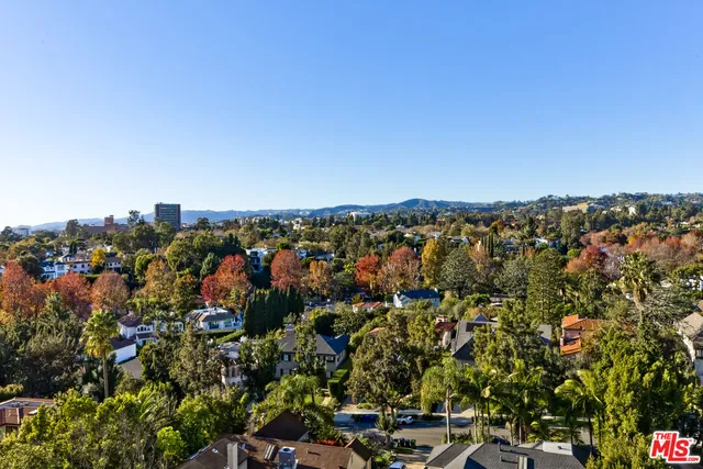 a view of a large building with a city view