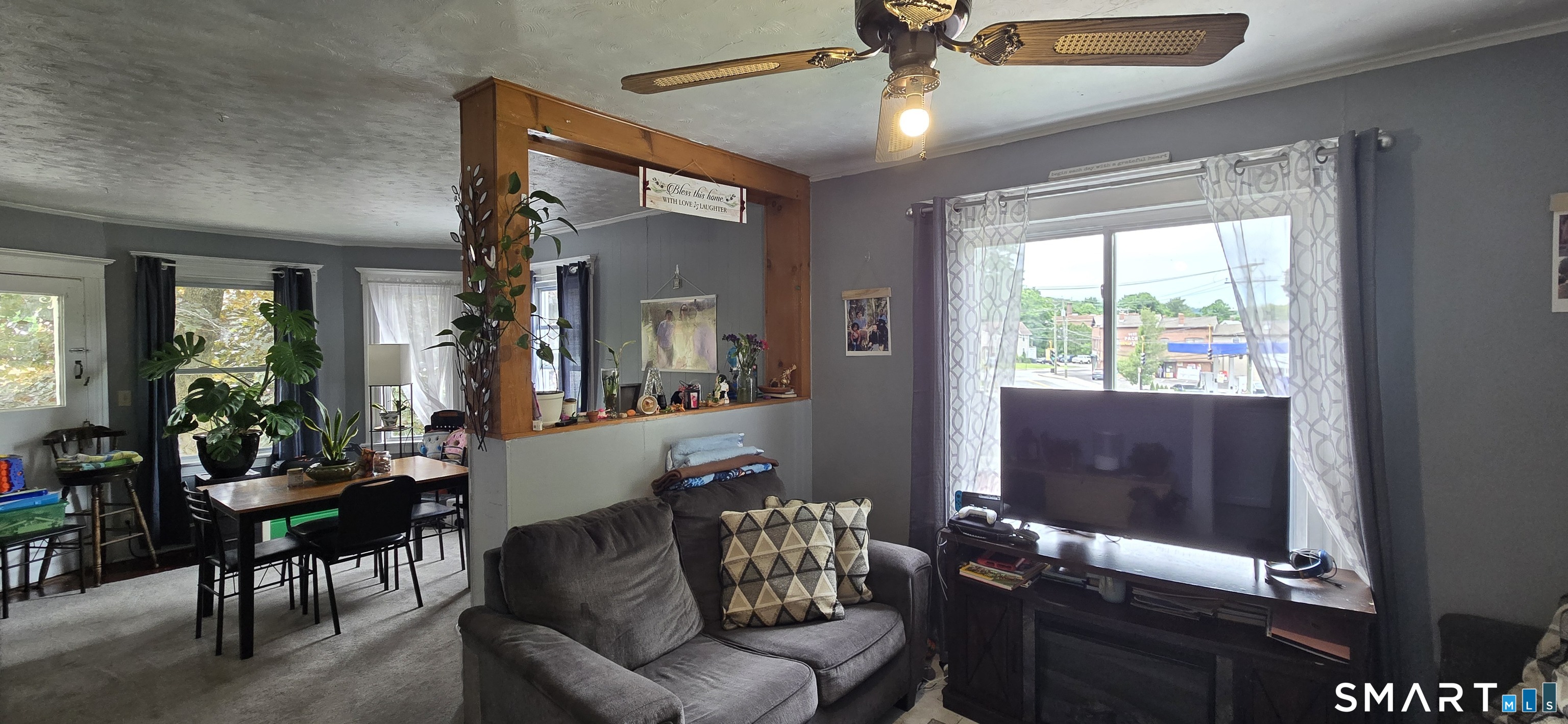 25 High Street Torrington, CT 06790 - Photo 2 of 16 a living room with furniture and a window
