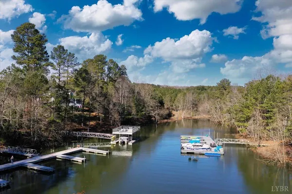 a view of a lake with boats and trees