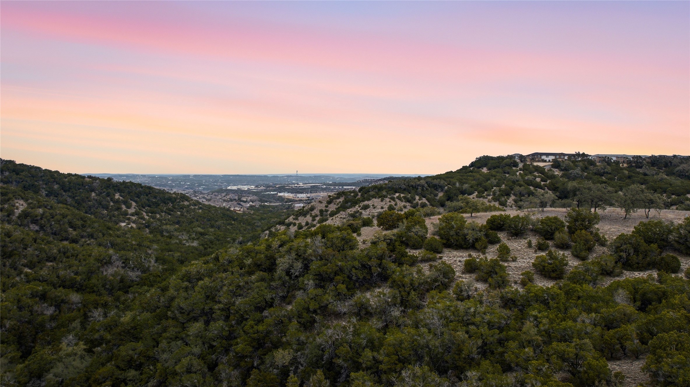 6204 Madrone Tree Lane Austin, TX 78738 - Photo 9 of 14 an aerial view of mountain with trees