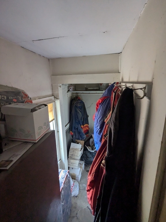 14 Washington Avenue Ashland, MA 01721 - Photo 16 of 23 a view of walk in closet with clothes and shoes