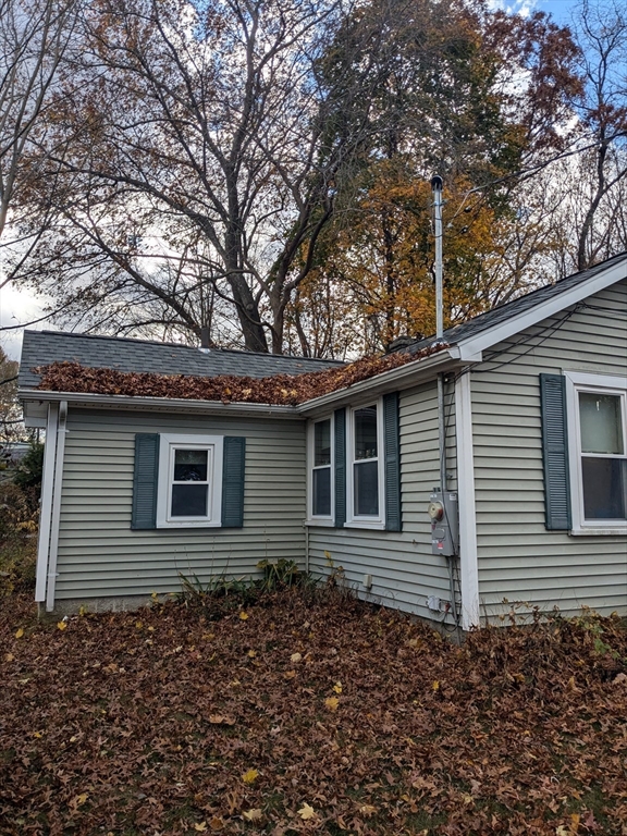 14 Washington Avenue Ashland, MA 01721 - Photo 2 of 23 a house with trees in the background