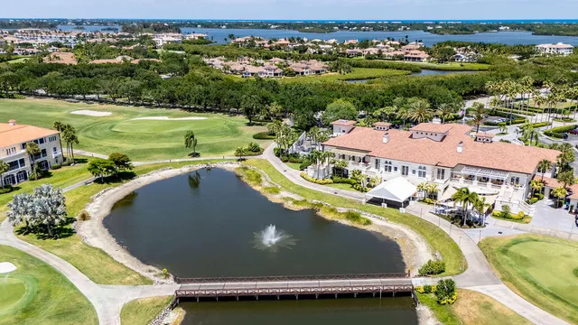 an aerial view of a house with a swimming pool