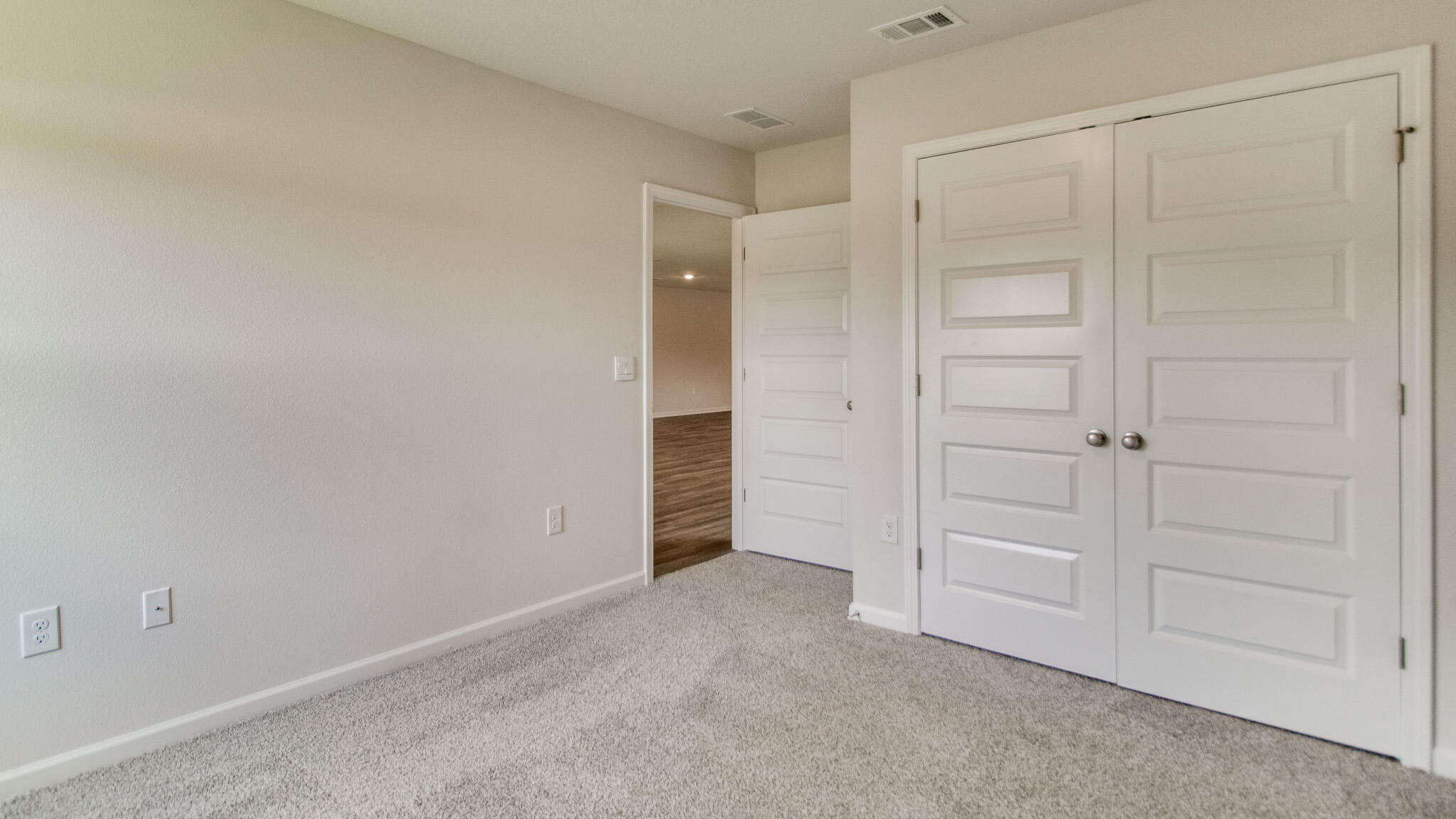 5620 Thatcher Road Crestview, FL 32539 - Photo 24 of 30 an empty room with closet area