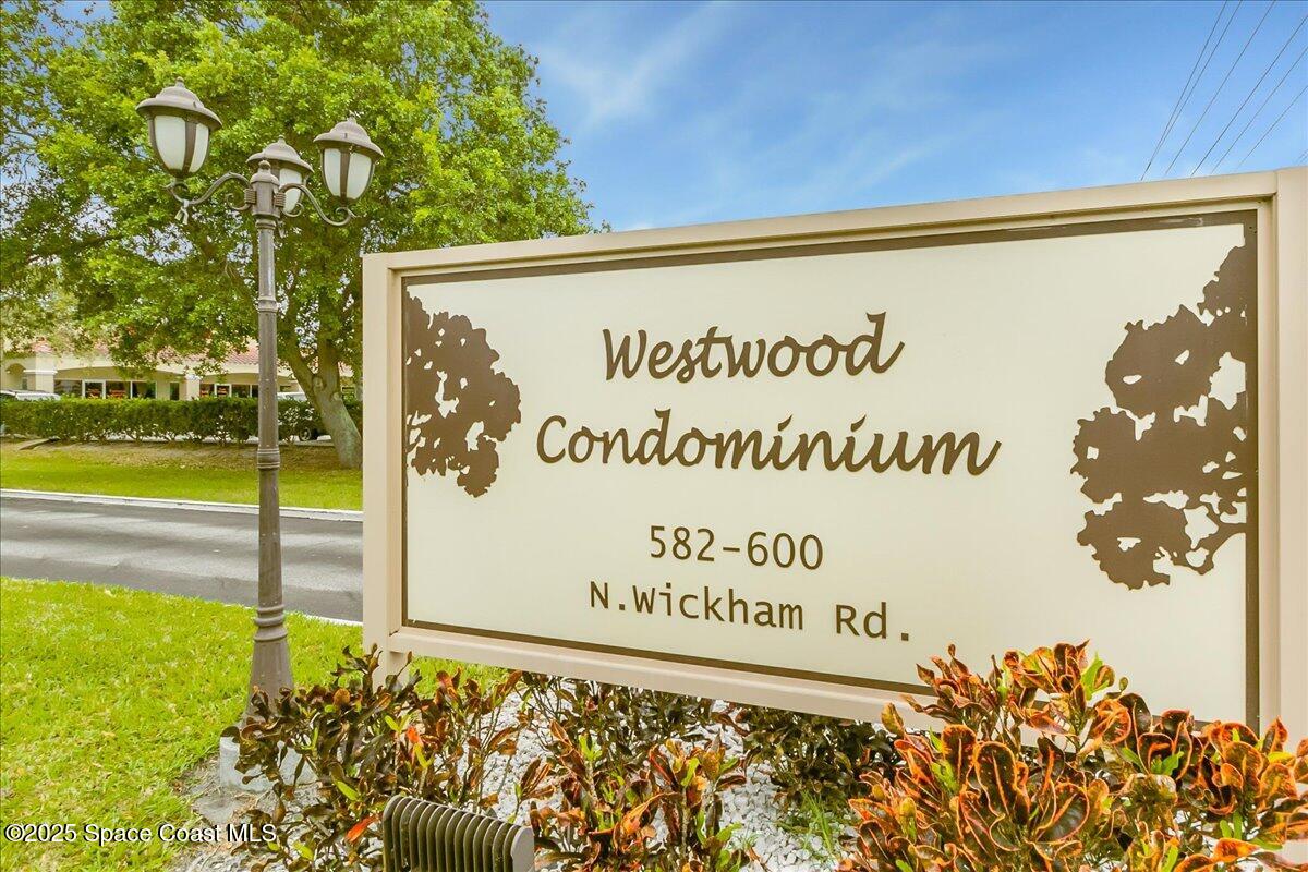 586 North Wickham Road, Unit 63 Melbourne, FL 32935 - Photo 58 of 83 a sign on the side of the building