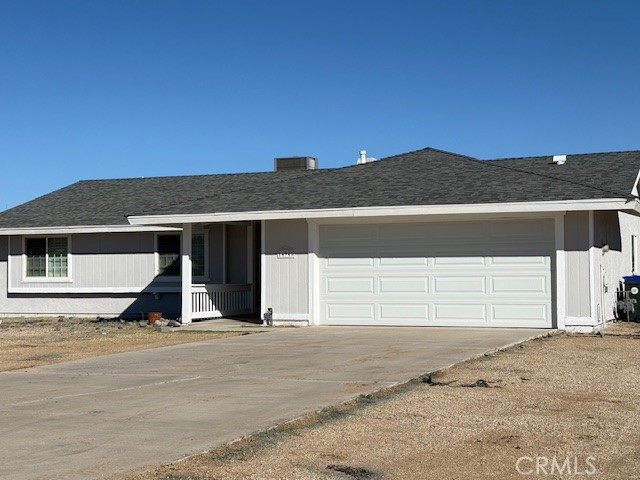 14945 Tonikan Road Apple Valley, CA 92307 - Photo 1 of 1 a view of a house with a backyard